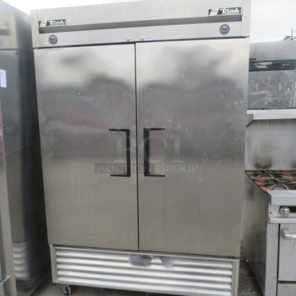 True Model T-49DT stainless steel refrigerator/freezer combo with 6 racks, on casters, 115V, 54x29.5x83 inches, used condition.