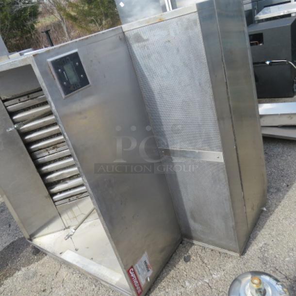 Stainless steel Captive Air hood system with return air and Ansul, visible controls and ventilation components, good condition.