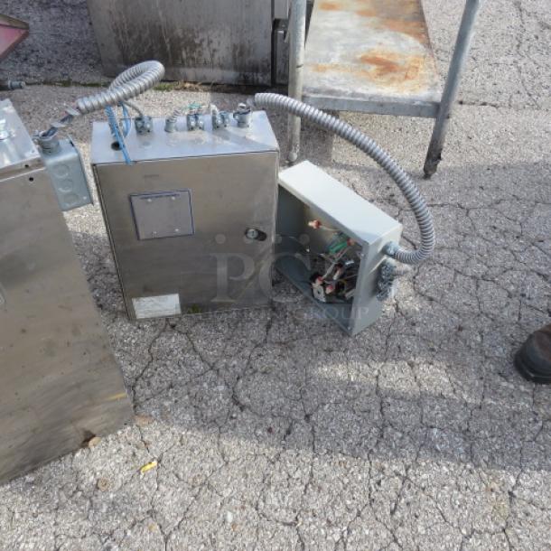 Stainless steel hood system with return air and Ansul mechanism, Captive Air brand, includes visible control boxes.