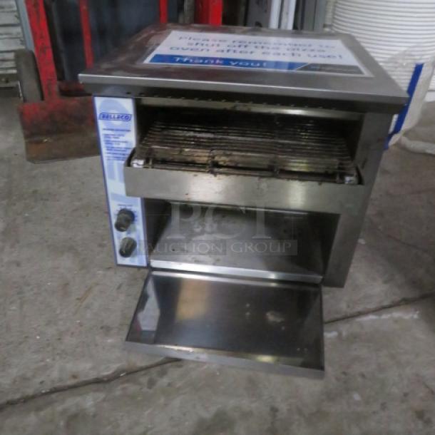 Belleco conveyor toaster, model JT-1, 120 Volt, stainless steel, 14.5x18x13 inches, dual controls, open crumb tray.