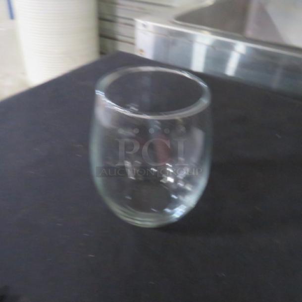 Luminarc 20.75oz stemless wine glass, clear glass, simple design, excellent condition, perfect for casual dining.