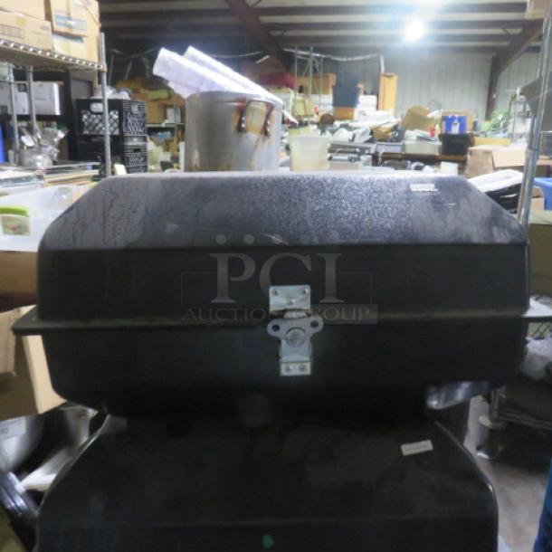 Stainless steel, 3-tier chocolate fountain; 115V, 1500W; commercial grade; showing closed carrying case.