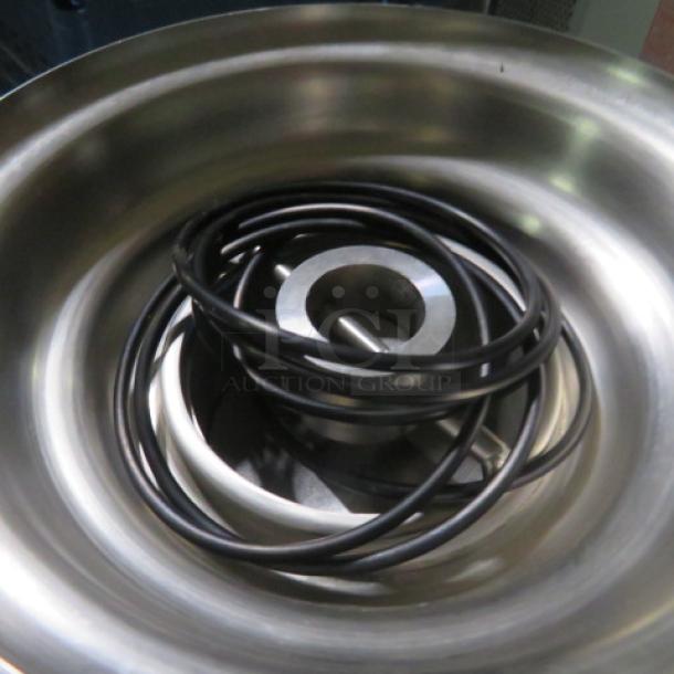 Stainless steel 3-tier chocolate fountain, 115V, 1500W, in excellent condition. Coiled cable included. Valued at $3471.71.