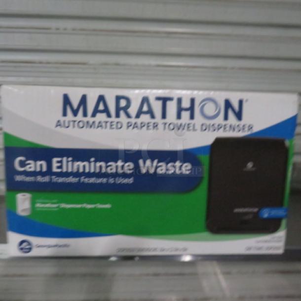Marathon Automatic Hands Free Paper Towel Dispenser, new in box, features automated hands-free operation, eliminates waste.