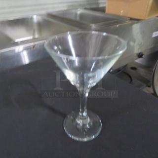 Embassy 9-1/4 oz martini glass, clear glass, clean condition, wide rim, sturdy base, ideal for cocktail serving.