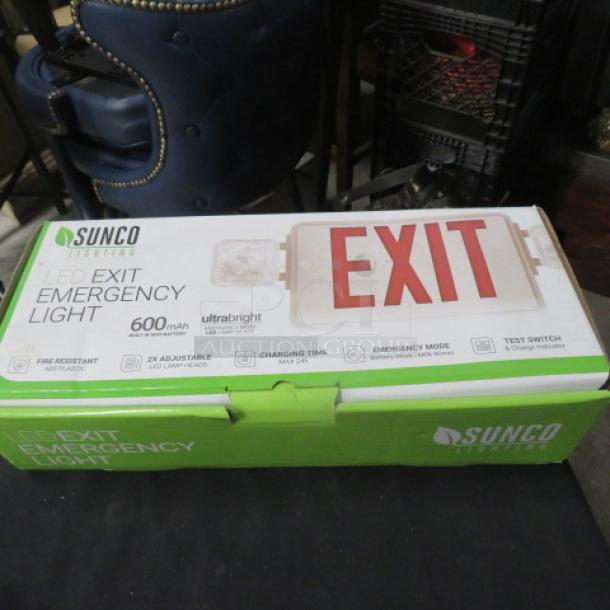 Sunco Lighting LED Emergency Exit Light, new in box, features 600mAh capacity, adjustable LED lamps, and emergency mode.