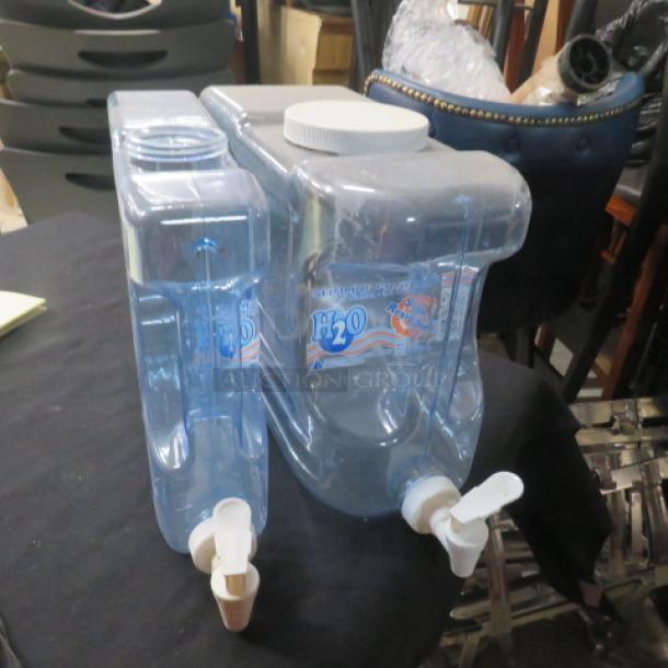 Assorted size fresh water tanks with spouts, clear plastic, labeled "H2O." Includes two tanks in good condition.