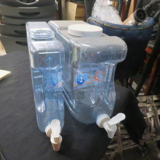 Assorted size fresh water tanks with spouts, clear plastic, labeled "H2O." Includes two tanks in good condition.