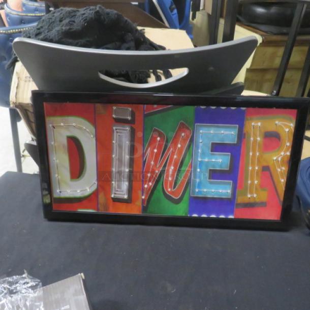 Colorful LED diner sign in black frame, reading "DINER" with illuminated letters. New condition.