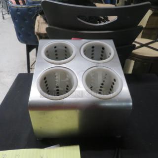 Stainless steel 4-hole flatware holder, used, with perforated inserts for drying. Ideal for restaurants or catering.