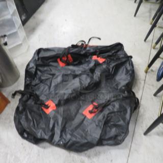 XXL heavy-duty zipper bag, black with red accents, durable material, suitable for storage or transport.