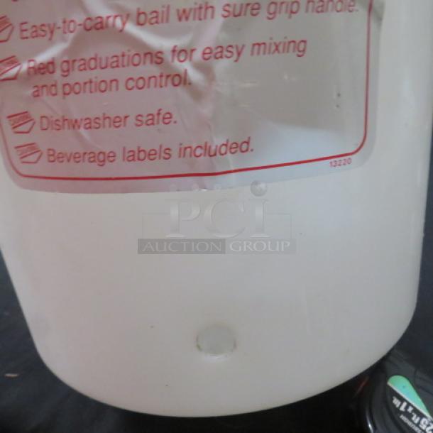 Cambro 20-quart beverage dispenser with lid and handle, no spigot. Features red gradations and includes beverage labels.