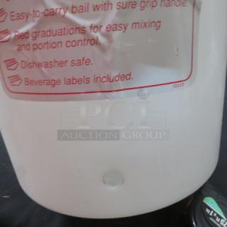 Cambro 20-quart beverage dispenser with lid and handle, no spigot. Features red gradations and includes beverage labels.