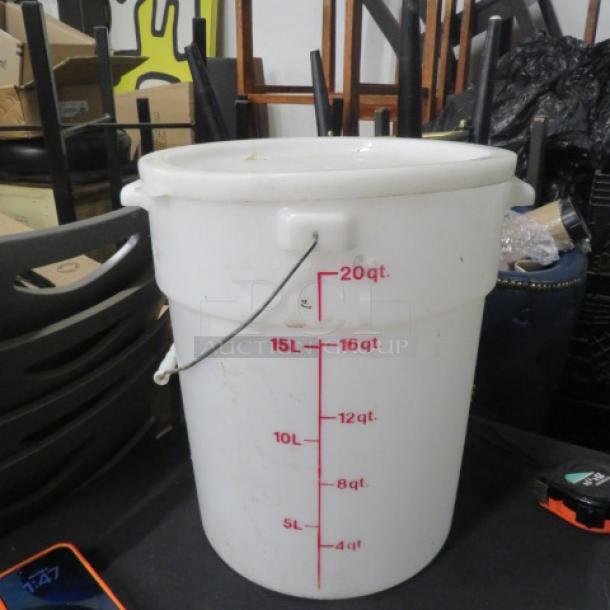 Cambro 20-quart beverage dispenser with lid and handle, no spigot, white plastic, red measurement markings, used condition.