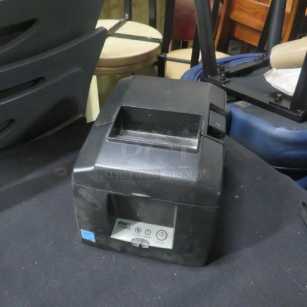 Star TSP650 thermal printer, black. Visible control panel, brand label. Good condition. Auction price: $285.19.