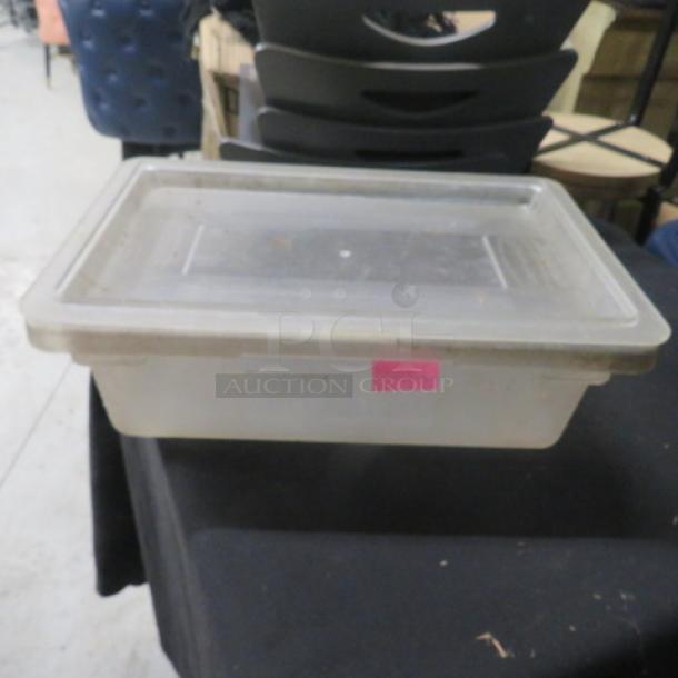 3.5-gallon food storage container with lid, clear plastic, used condition. Rectangular shape, pink label visible on the side.