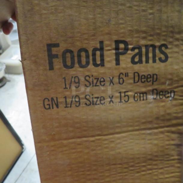 Cardboard box labeled "Food Pans" indicating Carlisle 1/9 size, 6-inch deep food storage container.