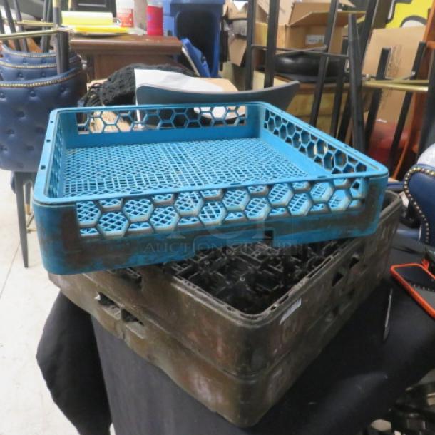 Assorted dishwasher racks, blue and brown, stackable, used condition, honeycomb pattern, item code 3XBID visible.