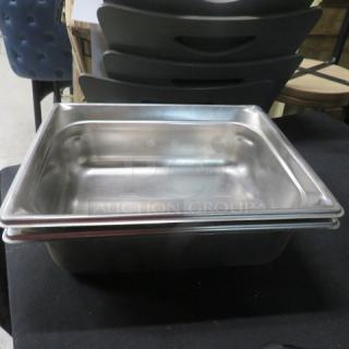 1/2 Size 4 Inch Deep Hotel Pan, stainless steel, good condition, stackable design. Ideal for catering or food service.