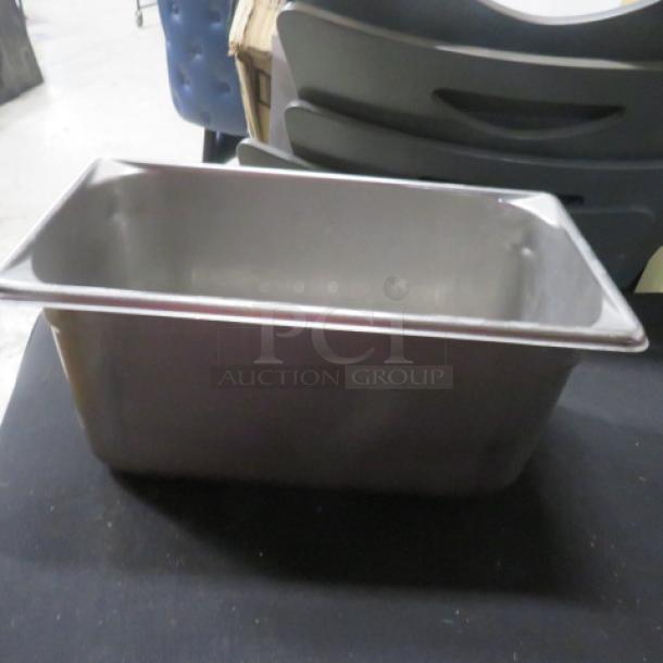 1/3 size, 6-inch deep hotel pan, stainless steel, used, visible scuff marks, suitable for commercial kitchen use.
