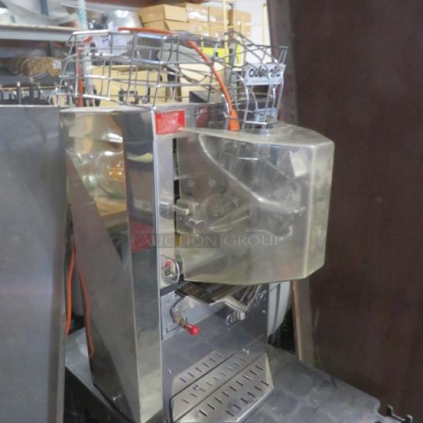 Automatic feed citrus juicer with self-serve tap, Model JM-30, stainless steel. Dimensions 18x24x31 inches.