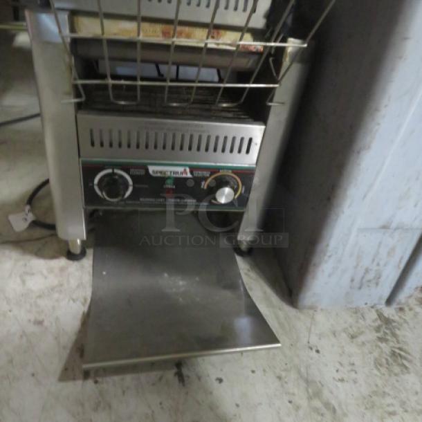 Spectrum Conveyor Toaster ECT700, 208/240 Volt, 14.5x16x17 in., control knobs, good condition.