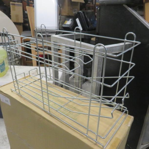 NEW Wire 10lb Can Rack, model CR242. Durable metal construction, pristine condition, ideal for storage.