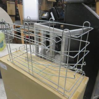 NEW Wire 10lb Can Rack, model CR242. Durable metal construction, pristine condition, ideal for storage.
