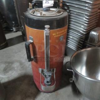 Fetco Luxus 1.5 Gallon Beverage Dispenser, Model TDP15, good condition with Starbucks branding, black handle.