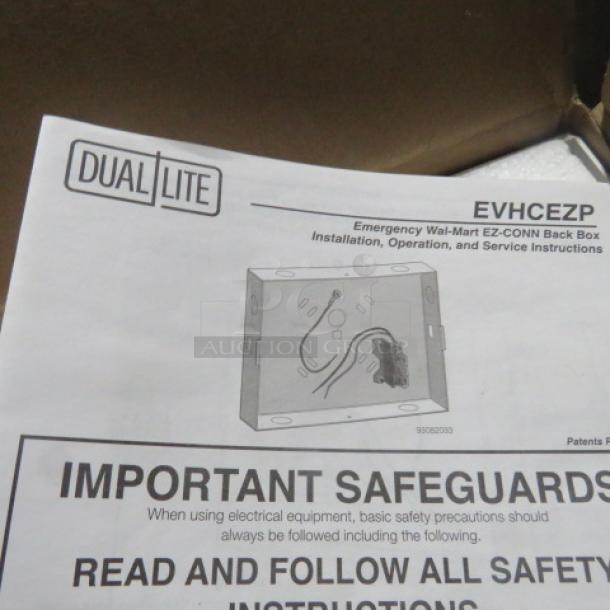 Dualite LED emergency light back box EVHCEZP with installation instructions shown in packaging.