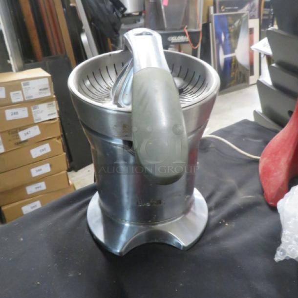 Breville 800CPXL Citrus Press, 110W, 120V, stainless steel, used condition. Handle and cone visible, sturdy base.