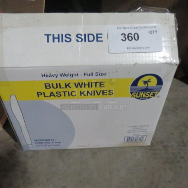 Box of Sunset bulk white plastic knives, heavy weight, full size, 1000 per case, label shows item code MCRD0015.