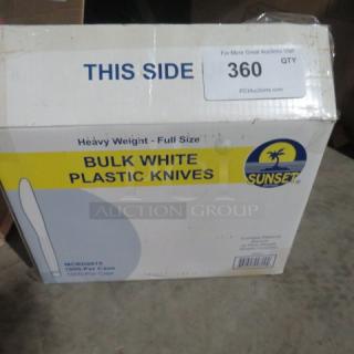Box of Sunset bulk white plastic knives, heavy weight, full size, 1000 per case, label shows item code MCRD0015.