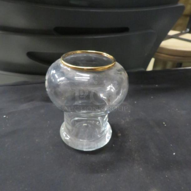 Tabletop glass candle holder with gold rim, clear glass, bulbous shape, excellent condition. Model: 10XBID.