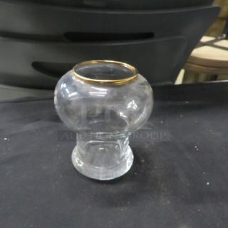 Tabletop glass candle holder with gold rim, clear glass, bulbous shape, excellent condition. Model: 10XBID.