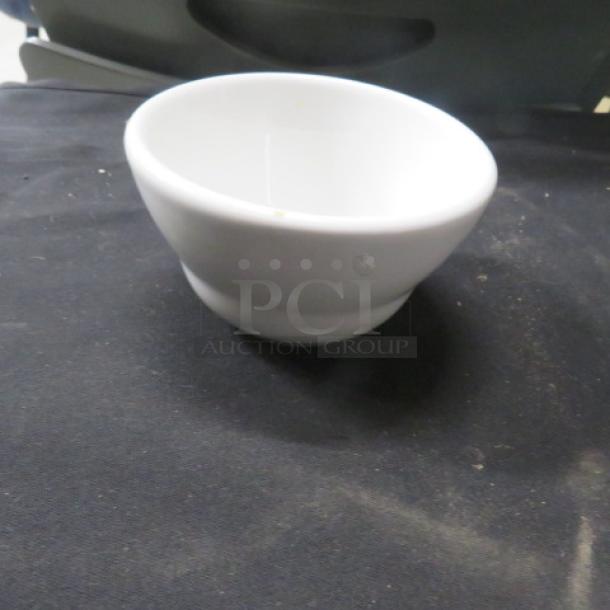 White ceramic salsa bowl, smooth finish, round shape, clean condition, model 10XBID, perfect for table settings.