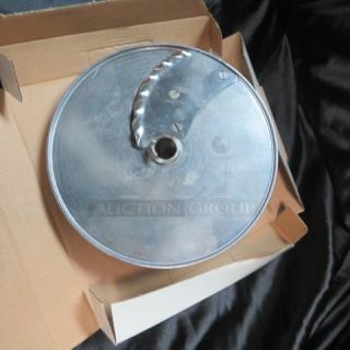 New Robot Coupe blade in original packaging, stainless steel, pristine condition, designed for precise slicing.