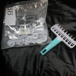 New pastry cutter with assorted blades, teal handle, in packaging. Includes multiple blade designs for versatile use.