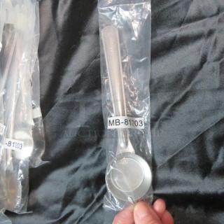 NEW stainless steel scoop in packaging, model MB-81003, pristine condition, suitable for kitchen or commercial use.