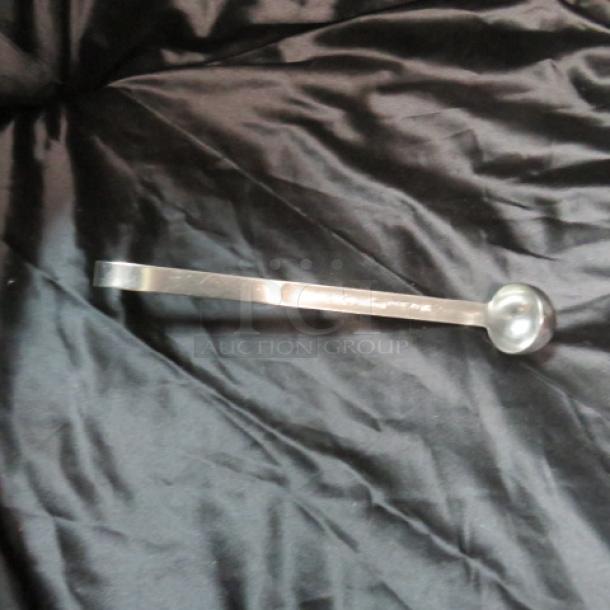 Stainless steel Vollrath 3/4oz ladle, model 49875, in excellent condition. Ideal for precise serving.
