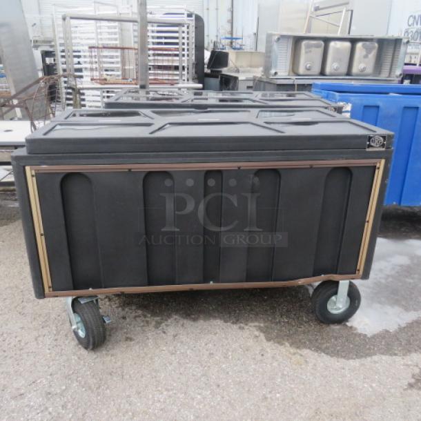 Super Arctic Black Mobile Cooler, model IRP-1030, 456 Qt, 60x32x38.5 in, on casters, with lids, excellent condition.