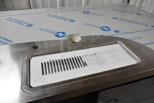 Beverage Air DD68HC-1-B-016 kegerator, unused, visible scratch. Metal surface, double tap holes. 115V, 1 Phase.