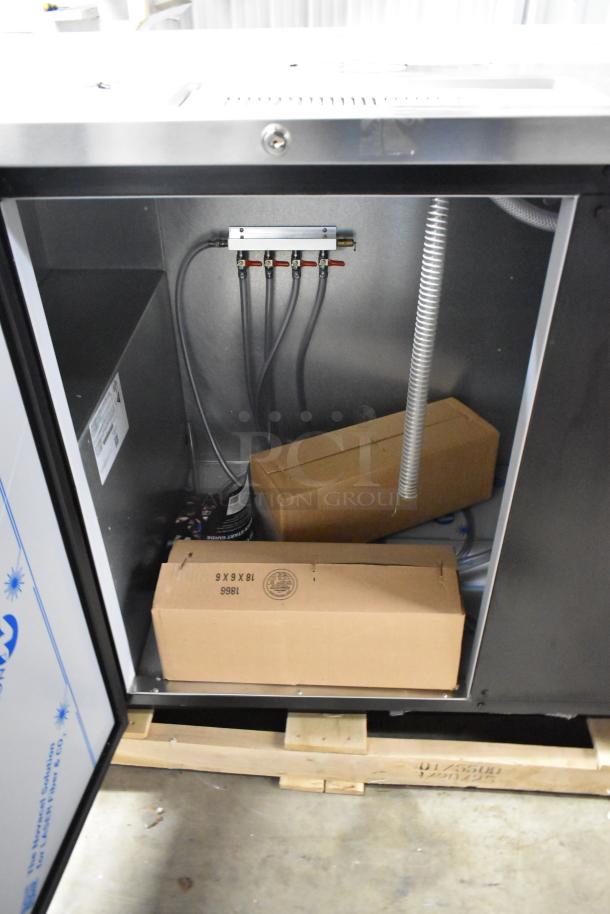 Beverage Air DD68HC-1-B-016 kegerator interior, showing new condition with cardboard packaging. Features dual tap connections.