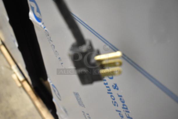 Close-up of a power plug from a Beverage Air DD68HC-1-B-016 kegerator, brand new with minor cosmetic defects.