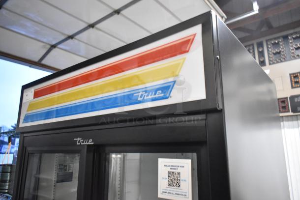 Brand new True GDM-33-HC-LD commercial cooler, 2-door, metal body, poly-coated racks, 115V, scratch and dent condition.