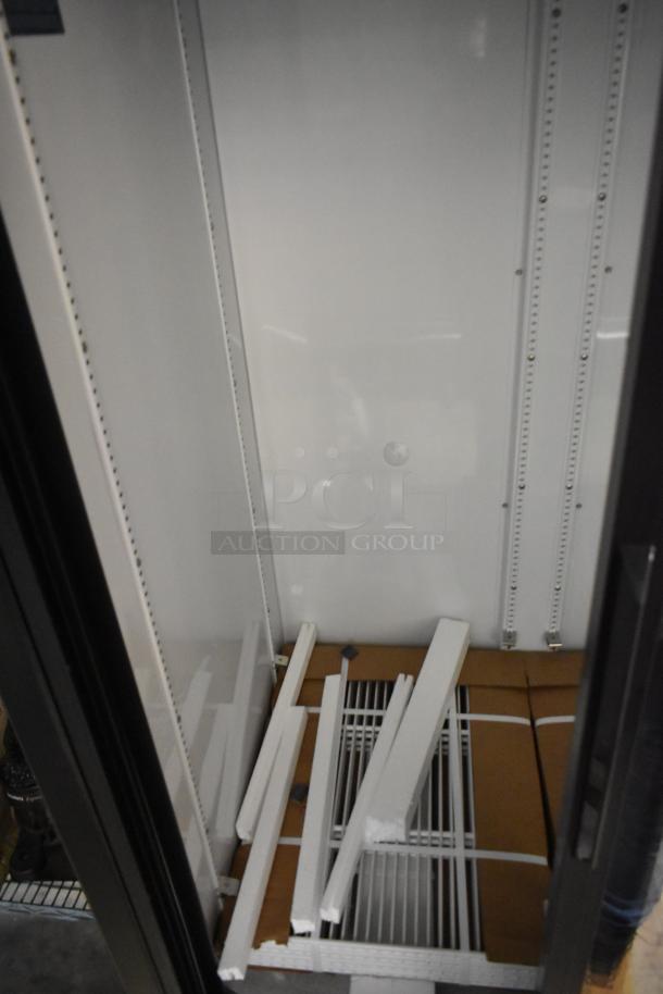 Brand new 2025 True GDM-33-HC-LD 2-door cooler merchandiser, scratch and dent, with poly-coated racks, 115V, 1 phase.