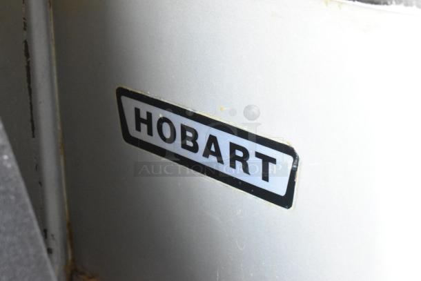 Hobart P660 metal commercial 60-quart planetary dough mixer with mixing bowl, 208V, 1-phase, showing the Hobart label.