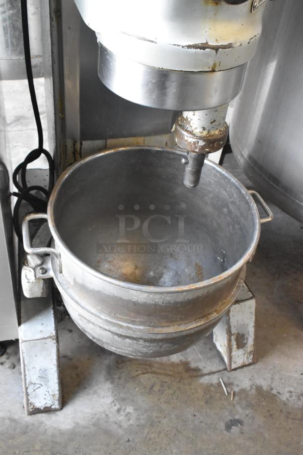 Hobart P660 60 Quart Metal Commercial Dough Mixer with metal bowl. Floor model, 208V, 1 phase. Some visible wear.