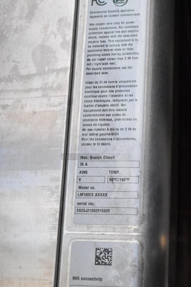 Stainless steel label on Rational iCombiPro convection oven, model LM100CE.AXXXX. Shows specifications and wiring guidance.