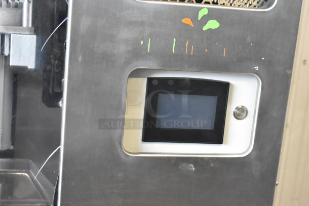 JBT 2ND-GEN-MFJ-HE stainless steel citrus juicer, commercial floor style, touchscreen panel, on casters, 120V, 1-phase.